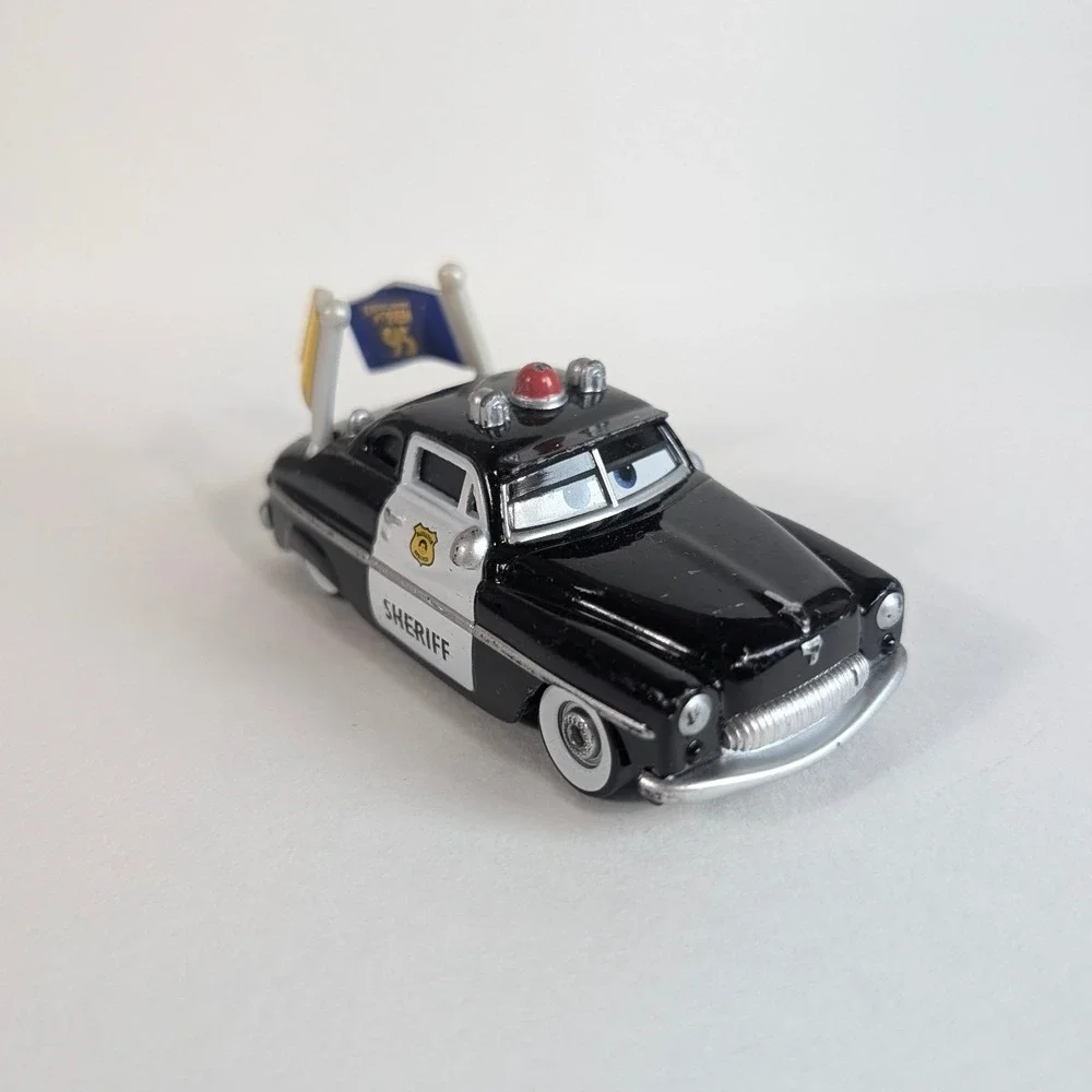 Disney Pixar Cars Sheriff Diecast Police Car with Dinoco & 95 Flags Mattel Rare